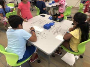 Students at Parkside ES in Morrisville use dry-erase tables for Math lessons